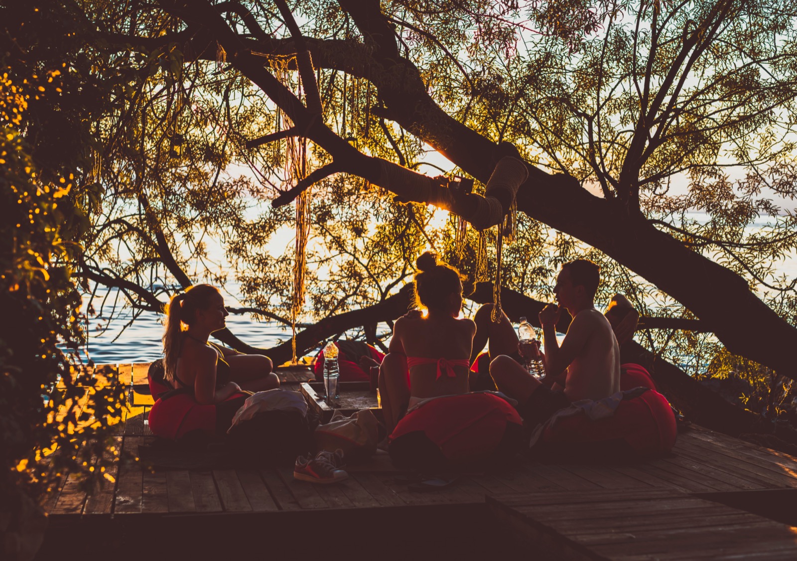 Couples and friends at a sunset beach setting